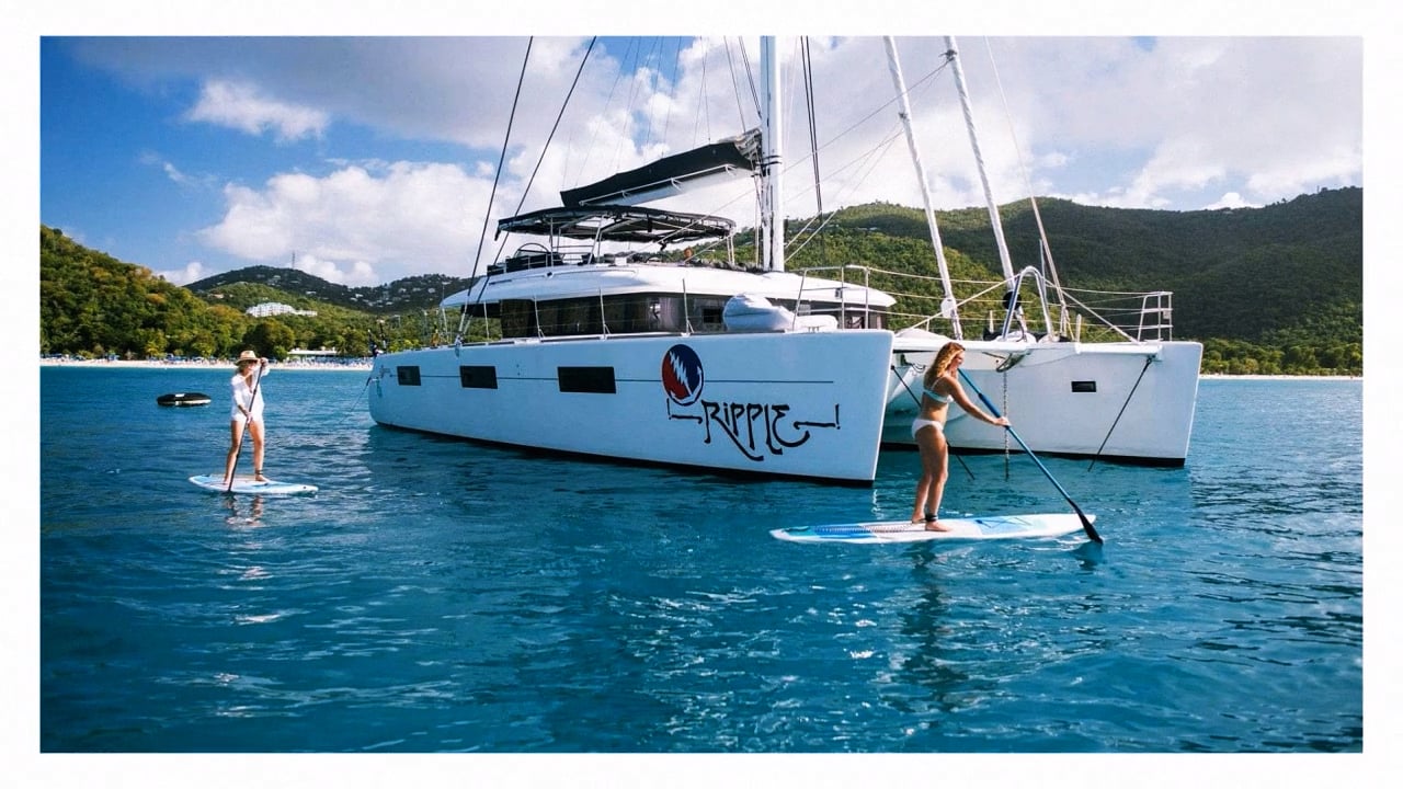 Guests paddleboarding from Ripple catamaran in the Virgin Islands